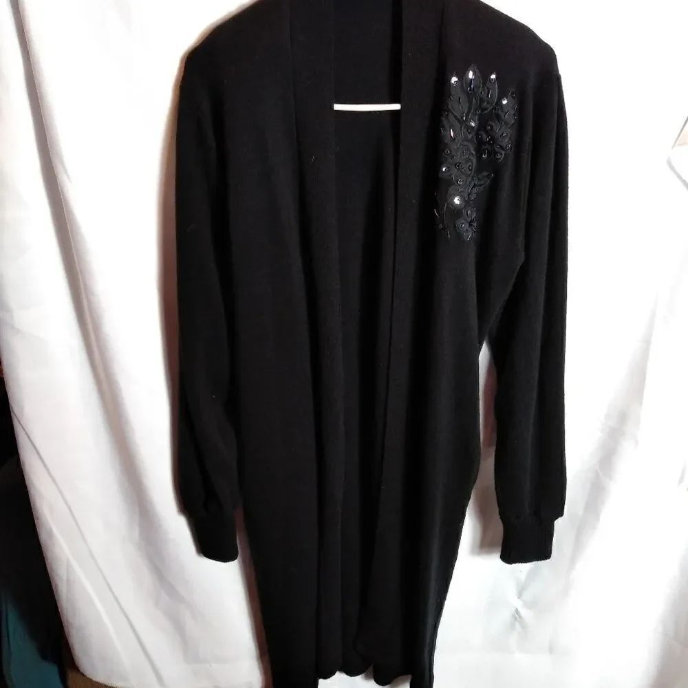 Long sweater with applique and beading
